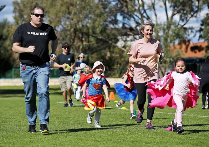 Parents joined the children in the Dash for Darcy fundraiser. 