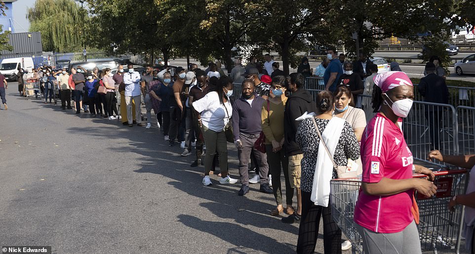 Long snaking queues also formed at Costco in Chingford, north London, this morning with specialist barriers set up in a zig zag formation to control the growing crowds